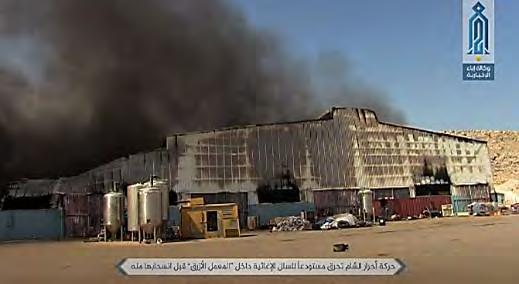8 Food warehouse in the Blue Factory compound near the Bab Al-Hawa border crossing, which was set on fire by the Ahrar Al-Sham