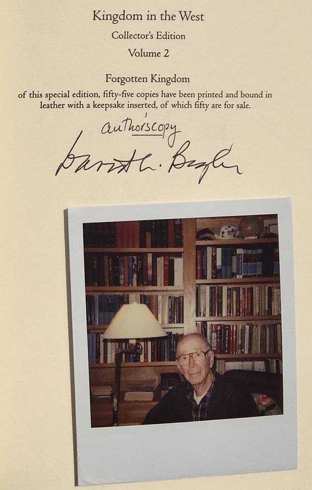 This is the author's copy with a Polaroid photograph of David Bigler sitting in his study laid in.