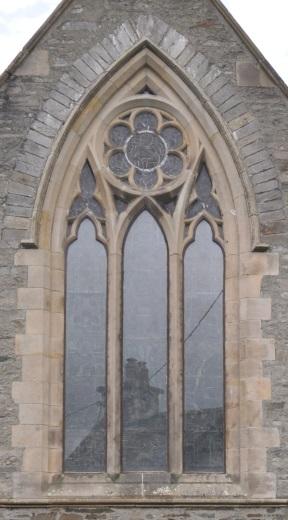 Figure 16: East Chancel Window Early geometric style (late thirteenth and early fourteenth century) three light glazed lancet window in the east chancel wall surmounted by an apex circle enclosing