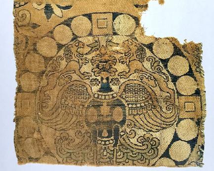 * It is, for example, tempting to regard the frontally presented eagle in a seventhcentury samite fragment from Central Asia (2) 