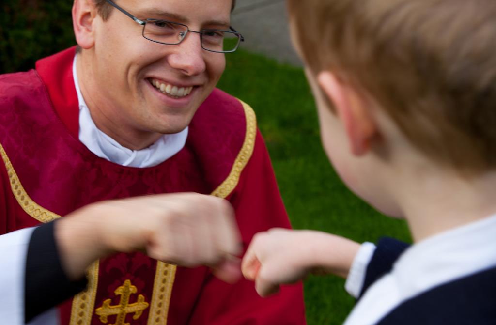 How do you think the priest feels in this photo? 3. What could he be thinking? 4. How might the boys in these photos feel? 5. In your own words, why is the priesthood important?