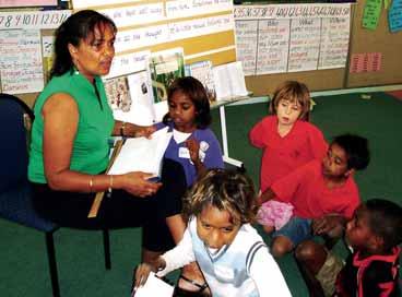 Sandra is shown in the photo presenting an Accelerated Literacy lesson to Year 2 and 3 students, from left, Ceciline Lannigan, Mikayla Jinderah, Olive Johnstone, David Skeen and Narkeliya Birrell.