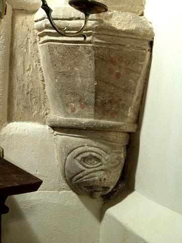 A 12th century tub font, the 12th century nave and 12th century chancel,