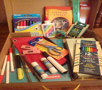The kits include items such as: folders, notebooks, paper, scissors, rulers, pens, Crayons, markers, etc.