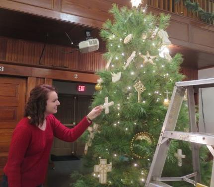 The tree has ornaments of gold, silver and white, all representing some aspect of the life and ministry of Jesus.