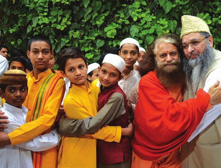 8 9 10 11 12 13 At the time of Ramazan, children from madrasas across Uttarakhand and Delhi come together alongside Imam Umer Ahmed Ilyasiji with children of the Parmarth Gurukul 7