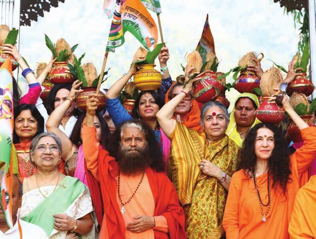 20 21 22 23 International Women s Day celebrations during the International Yoga Festival with Pujya Swamiji, Sadhvi Bhagawatiji, Dr. Vandana Shiva & Smt.