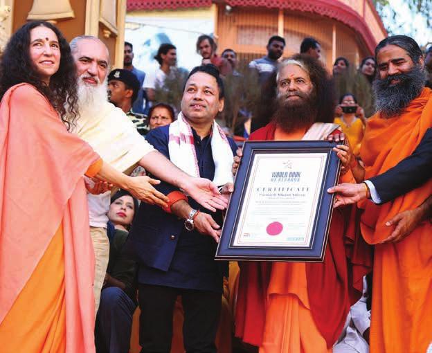E 17 18 19 20 21 Winter Solstice 16 Pujya Swamiji and Sadhvi Bhagawatiji presented with official certificate for the World Record of Biggest International Yoga Festival for hosting a record number of