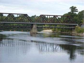 From Skibbereen to Androscoggin On the Trail of the Driscolls of Garrane Beg, Caheragh Free Black Bridge near Driscoll Island in Brunswick, Maine, USA photographer: Doug Kerr shared under the