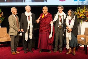 His Holiness's interpreter Thupten Jinpa, and panelists Arthur Zojonc, His Holiness the Dalai Lama, Richard Davidson and Amishi Jha at the conclusion of the 2nd International Symposium for