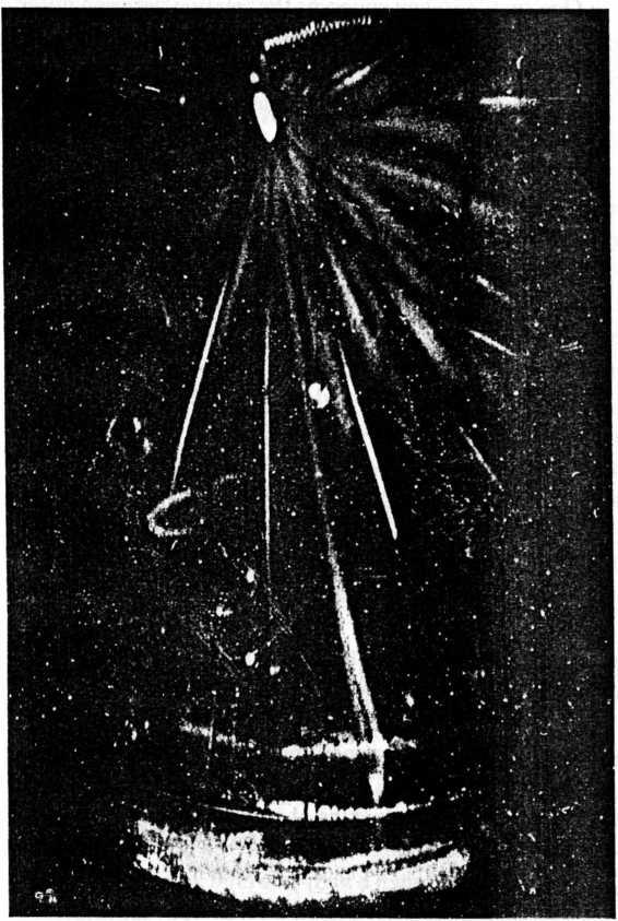 9. One of the first photographs to show the tracks of subatomic particles in a cloud chamber. The picture was taken by the cloud chamber s inventor, English physicist C. T. R.