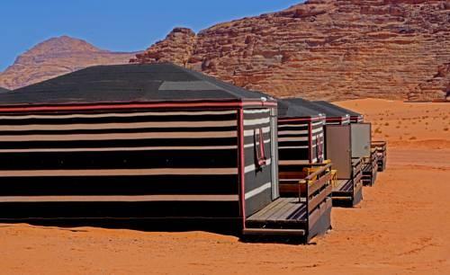 Day 11 Wadi Rum, Sun City Camp Located in the heart of Wadi Rum s majestic desert, enjoy a fully-equipped suite tent featuring the colorful carpets and styles in a Bedouin theme.