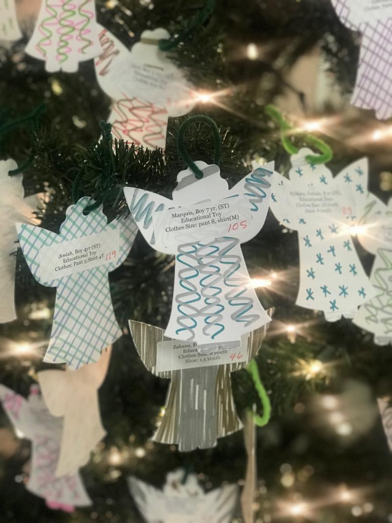 Did you know that there's a second angel tree in the church that supports the Coastal Coalition of Children? It's located in the Social Hall and there are still several angels hanging on the branches.