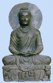 The most characteristic trait of Gandhara sculpture is the depiction of Lord Buddha in the standing or seated positions.