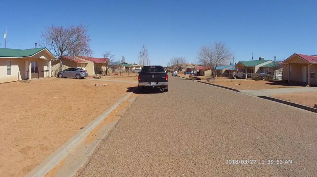 Figure 1: View of neighborhood from out front of Rose Johnson s house.15 29. One neighbor, who lives immediately next to Ms. Johnson, said that Mr. Grayeyes lives somewhere in Tuba.