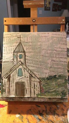 It s a painting of a church but the background is of popular hymns. The hymns are adhered to the canvas and then the picture of the church is painted.