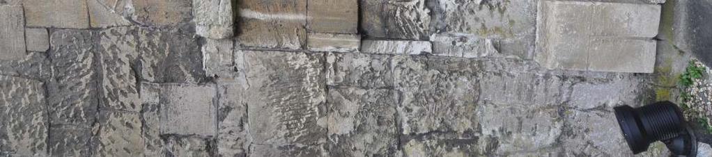 If these features had been shaved back to the line of the walling then the stonework