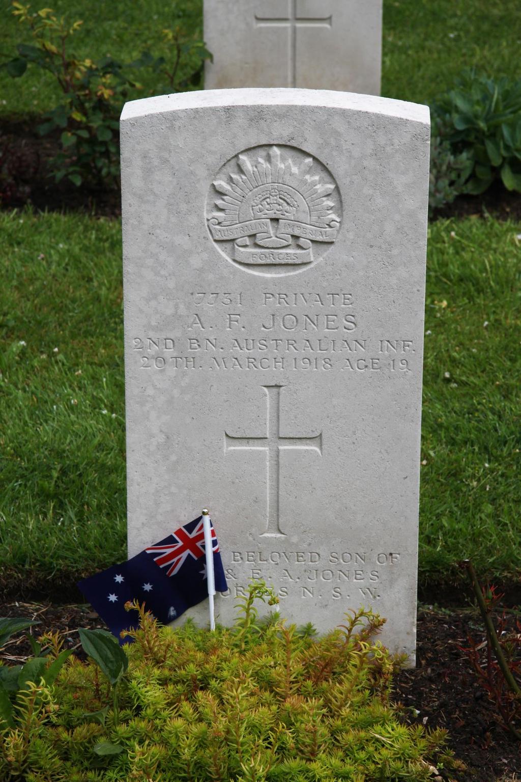 Photo of Private A. F. Jones CWGC headstone in St.