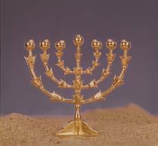 Page 7 ITEMS FROM THE HOLY PLACE The golden lampstand (menorah). heavens (Ps. 18:10).