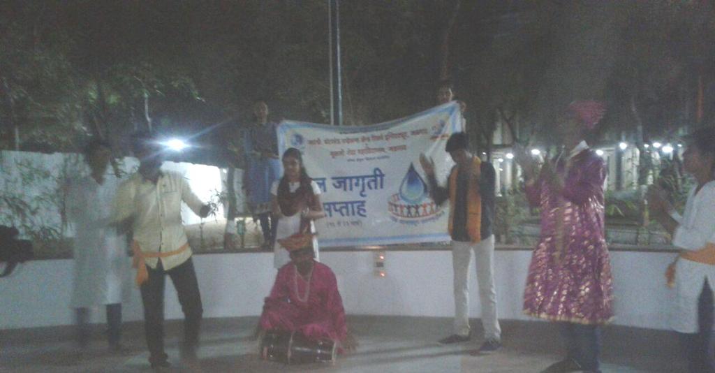 M.J.College students presenting a street play at