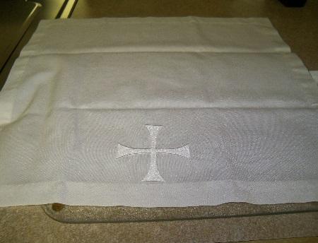 Purificator: A white linen cloth to wipe the