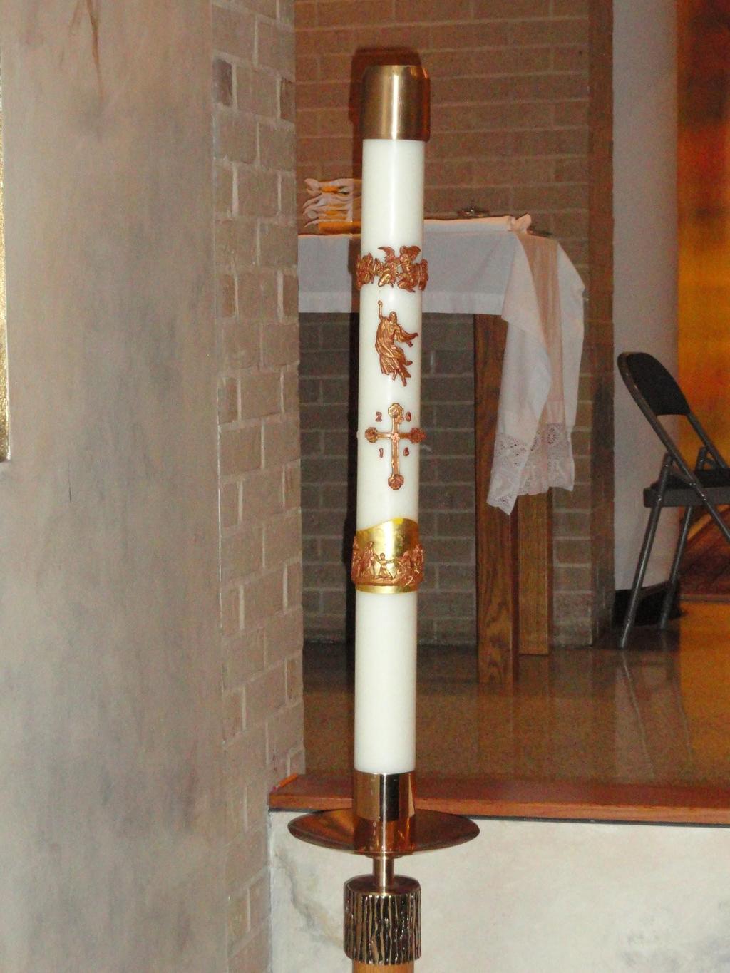 Paschal Candle A new Paschal candle is blessed and lit every year at Easter, and is used throughout the Paschal