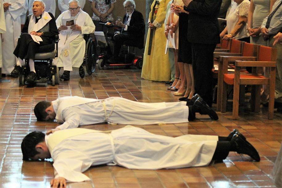 MARYKNOLL ORDAINS TWO NEW MISSIONARY PRIESTS Lying Prostrate for the Litany of the Saints