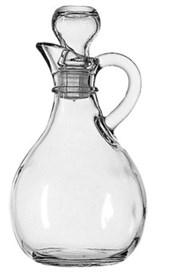CRUET Small glass vessel used for holding the wine and water required for Mass.