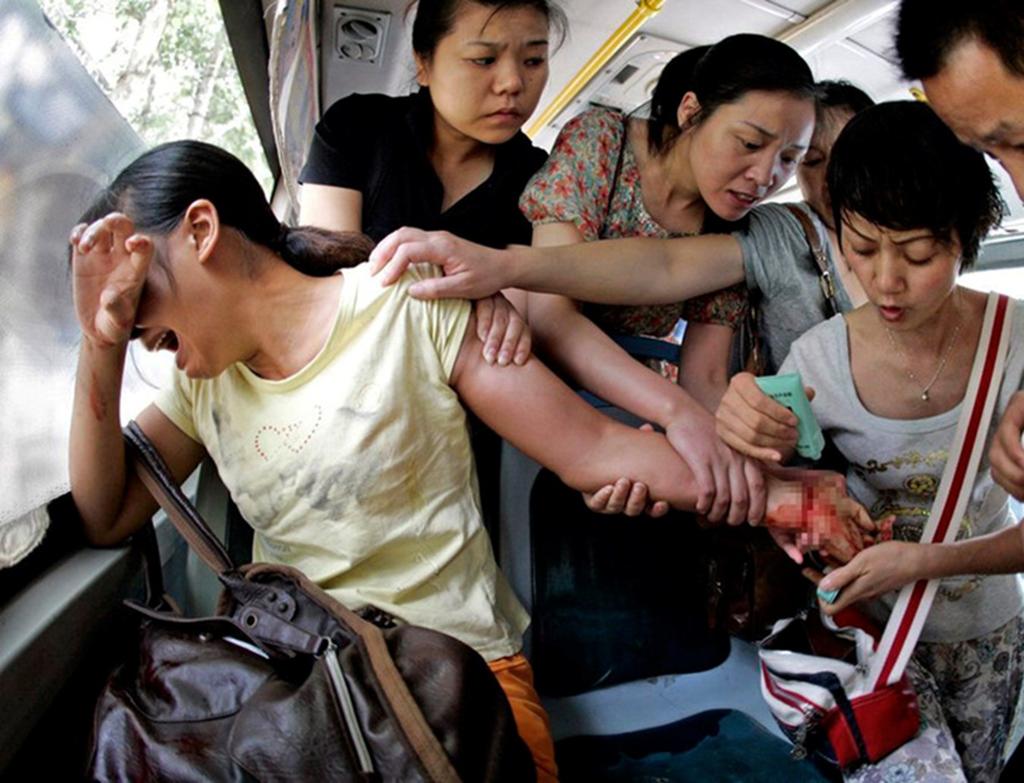 This is a Chinese woman who made an attempt to end her life on a bus in 2014. She found herself at the very end of her mental and physical strength.
