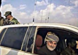 6 Left: Iranian Revolutionary Guards Qods Force Commander Qassem Soleimani with fighters of the Nujaba Movement.