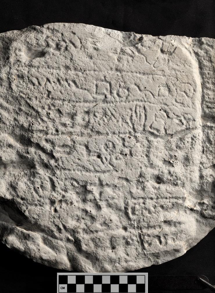 (ʔNT Z-ŠM RB NQBN MŠ ʕRQM LBʕLT [ʕ]ʔḤN Z-L ʕŠR [ ] TŠʕ [ ] ʕŠR [ ]) (Krahmalkov 2017b: 23 24) Figure 8: A plaster cast of Sinai 349 -The first M is a restoration.
