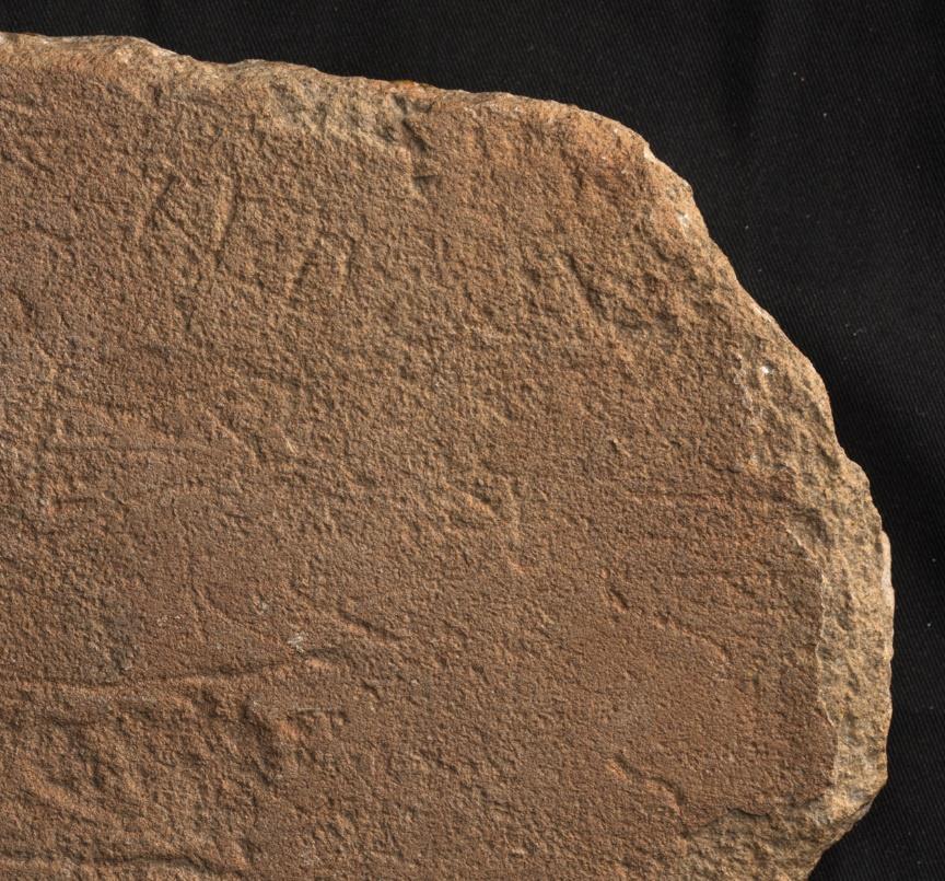 Figure 14: A close-up of the upper left corner of the inscription -HN YHW is an unwarranted restoration.