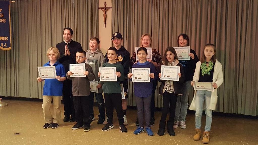 Center is veteran server, Ashley. Below: On Sunday, March 3, Bishop Navagh Columbiettes recognized and thanked all Altar Servers from Holy Spirit, St.