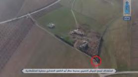 Right: Car bomb (in red) driven by a suicide bomber of the Headquarters for the Liberation of Al- Sham approaching two buildings where Syrian soldiers are staying, near