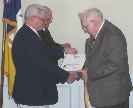 Charlie Scott received a Patriot medal for his service to the state society.