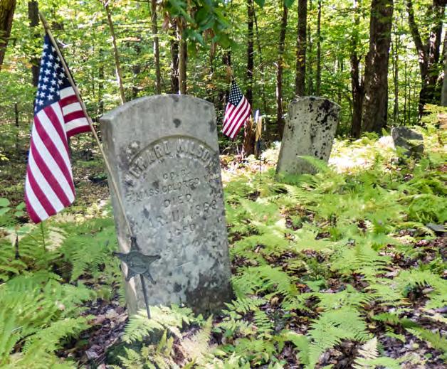 The cemetery is located on private property about 200 feet into the woods off the west side