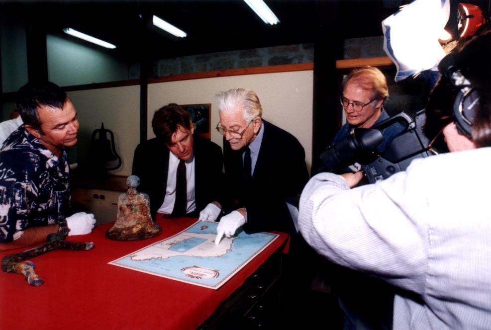 5 Photo: Brian Richards Gustave Rathe (centre) with his son Paul examining the Stefano bell in the WA Maritime Museum, Fremantle, 1998.