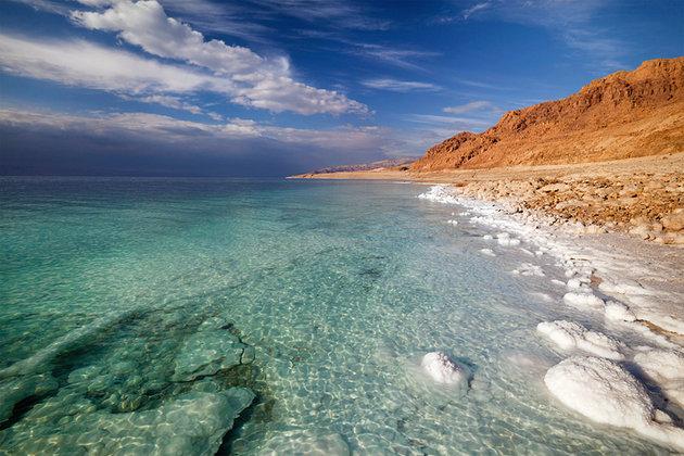 Dead Sea The Dead Sea, the lowest point on earth and one of the world's most wacky natural wonders, is the mineral-rich and overly salty sea where no one can sink.