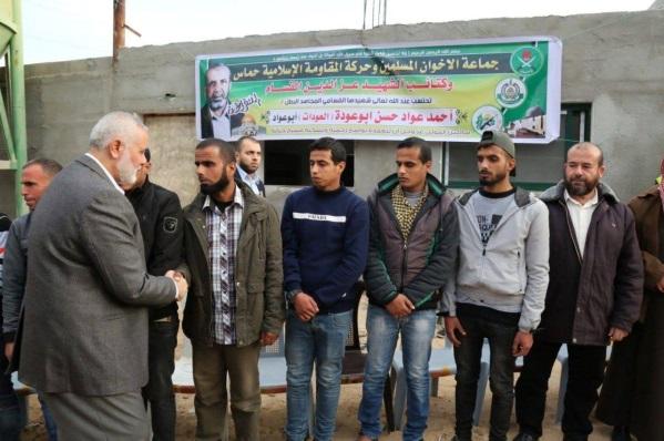3 Isma'il Haniyeh pays a condolence call to the mourning tent erected for the Palestinian who died from smoke inhalation.