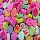 And nothing says, love more than one of those little heart-shaped candies with a Valentine message that you can t read on it, right?