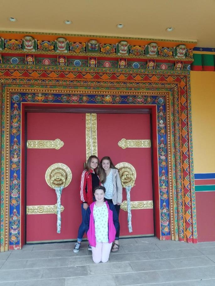 Confirmation Class in front of Buddhist Temple doors on their visit in May.