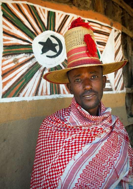 The men from Alaba all wear a very unique-looking hat.