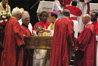 At the preparation of the gifts, as we sang Draw Me Close, the gifts were brought forward in a carrying vessel that represented the Ark of the New Covenant.