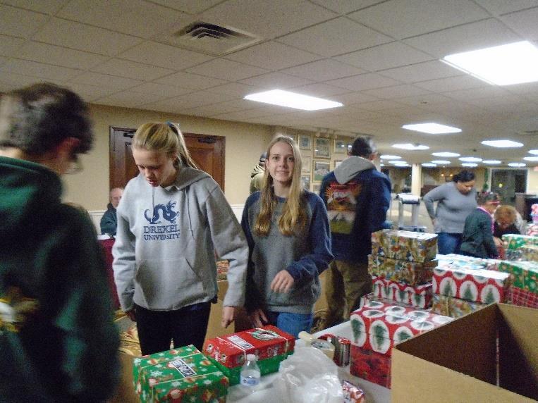 volunteered for the evening, packing and counting shoe boxes into larger boxes and loading