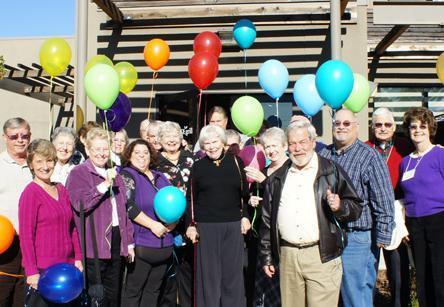 A parade of joy-filled congregants proudly marched through the crowd to the front of the room, each carrying a balloon as bright in color as the spirits of its owner.