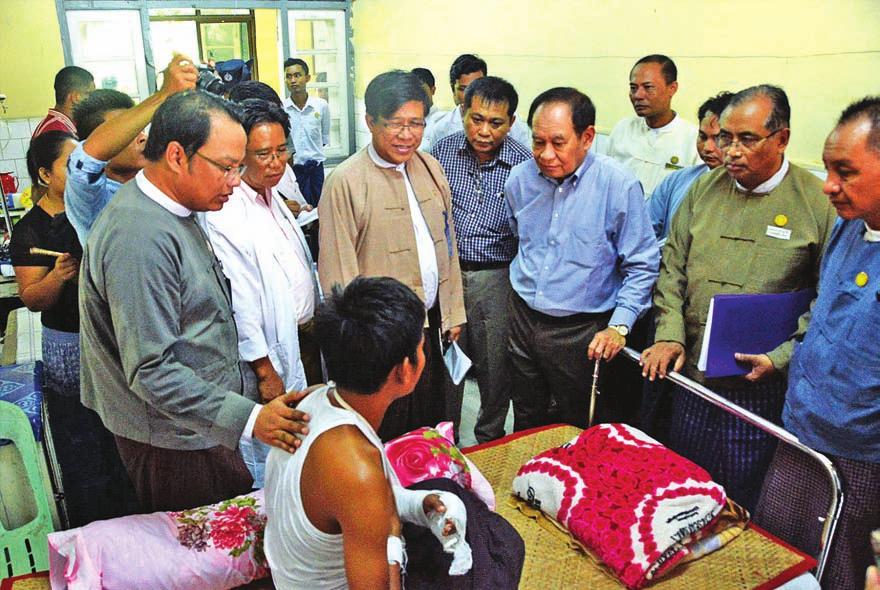 6 national Union Minister Dr. Myint Htwe visits patients wounded in terrorist attacks The Union Minister for Health and Sports Dr.