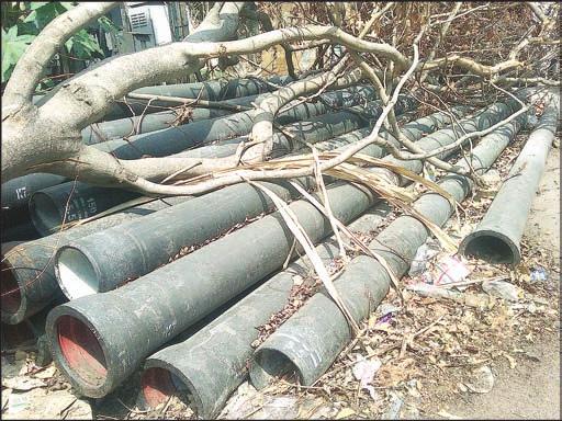 Concrete pipes dumped in South West Boag Road A number of concrete pipes belonging to Metrowater Board have been lying on the margin of South West Boag Road, near its junction with Mooparappan Street.