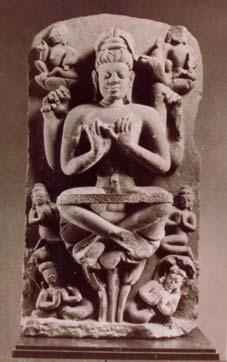 The citron in his right hand is the symbol of Brahma. There is a knob at the part in his hair, a shalagrama or shining place, a symbol of Vishnu.