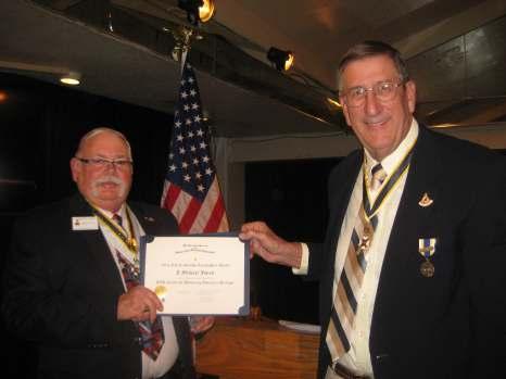 Michael Jones receiving his certificates from Chapter President David Swanson Compatriot William C. Orr was awarded the Liberty Medal certificate and bronze one oak leaf for his medal.