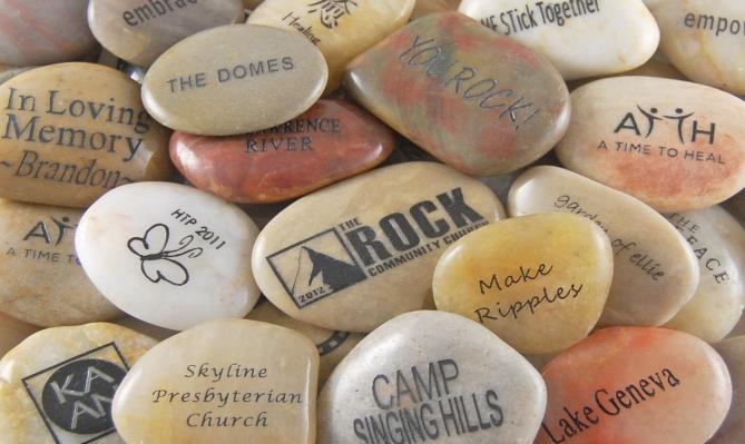 Custom Engraved River Rocks $2.25/each Natural river rocks range in size from 1 1/2-3 1/2 and vary in size and shape. Double sided engraving available for $2.75/each. Model 6412. Design Your Own!
